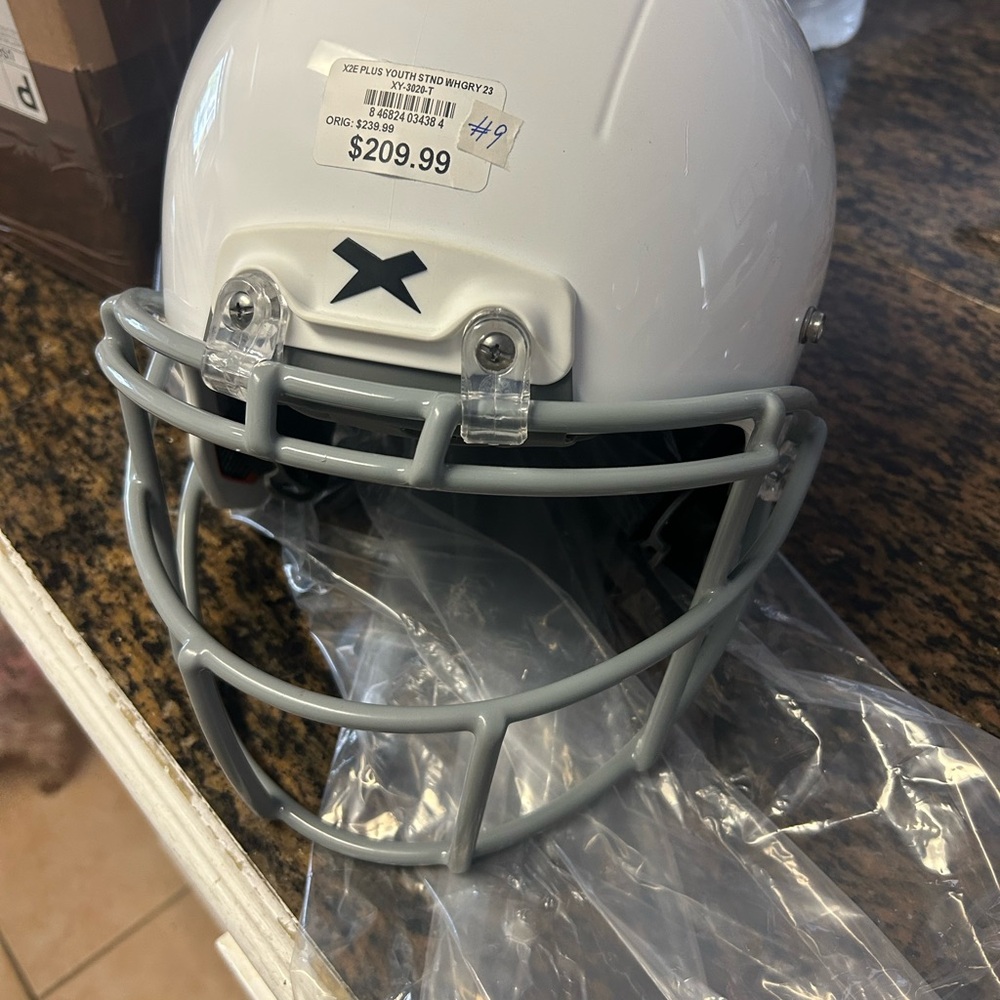 White Football Helmet with Gray Faceguard